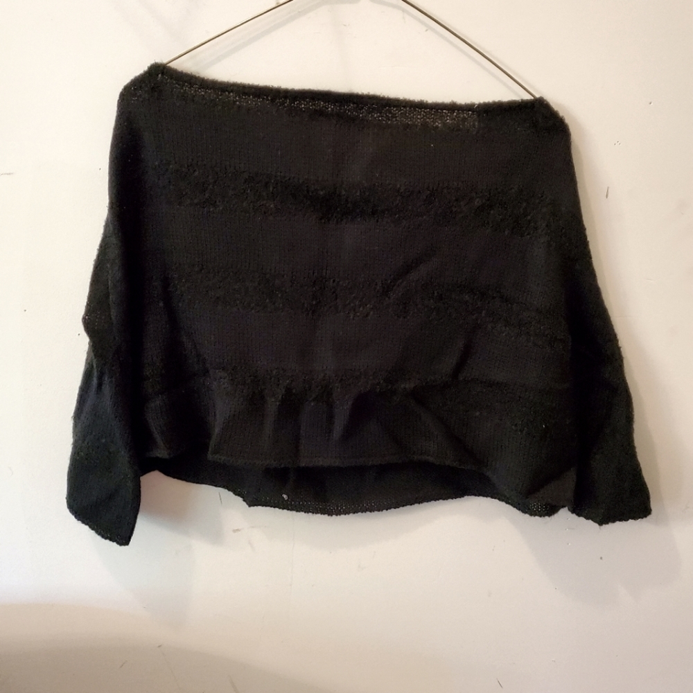 Black shawl.